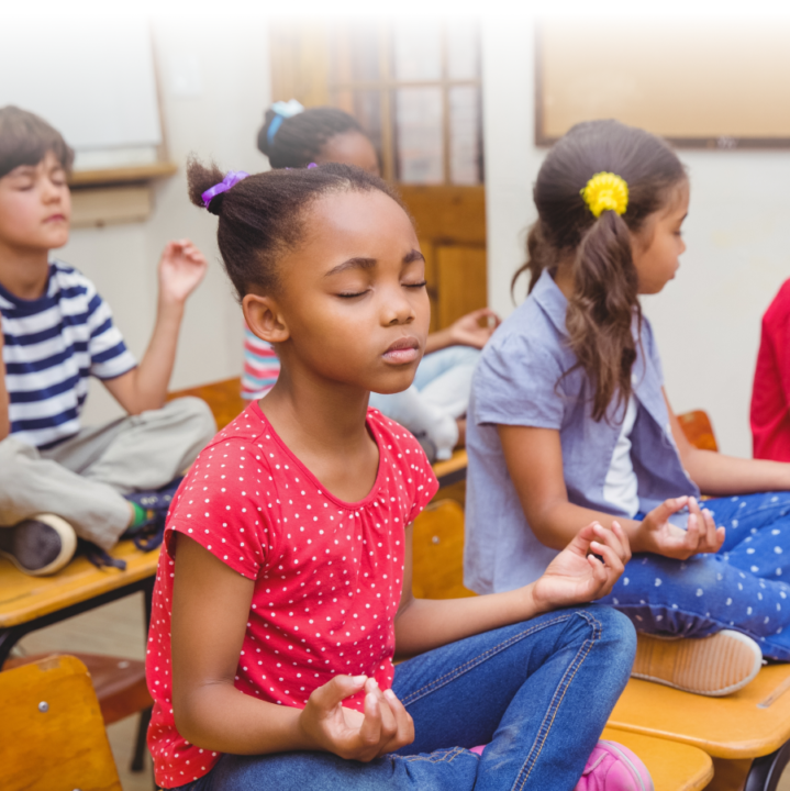 children meditating on their desks