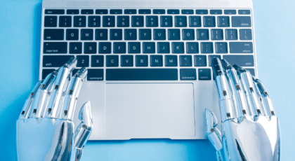 robot hands on computer